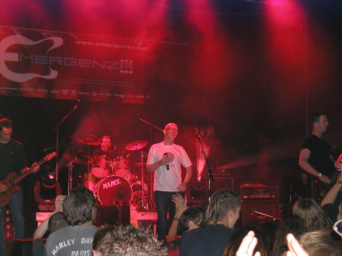 Band members smiling on stage at Volkshaus Zurich
