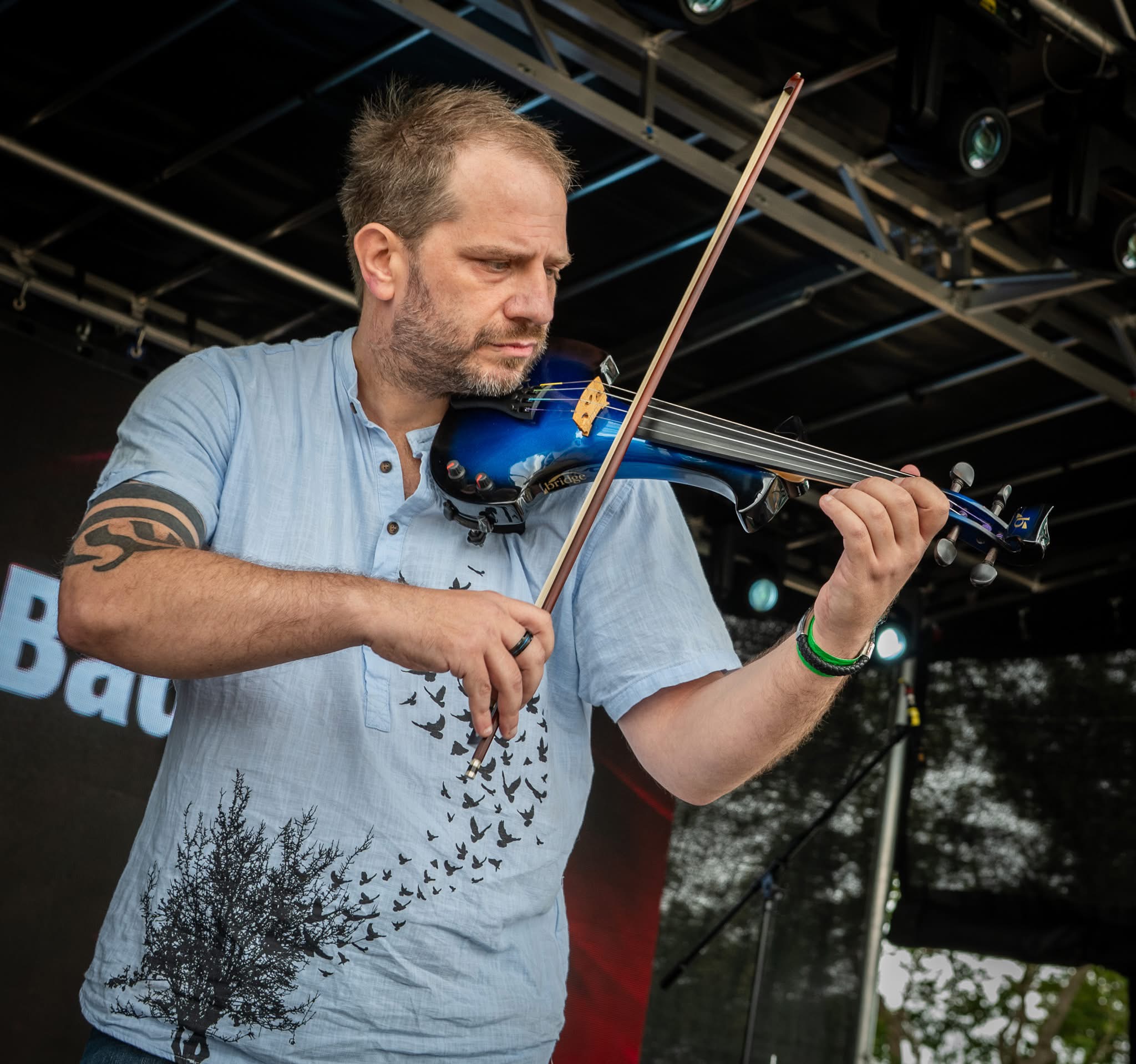 Violin player performing at Woo Fest 2025